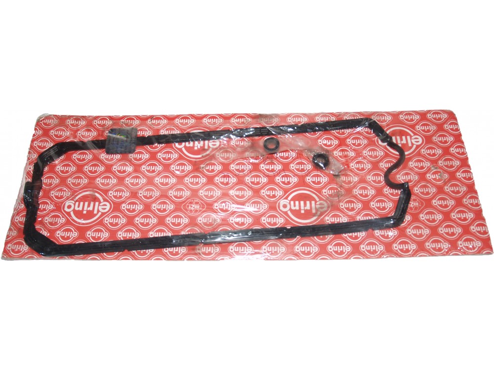 Прокладка клапанної кришки (не комплект, не хватає декількох втулок)